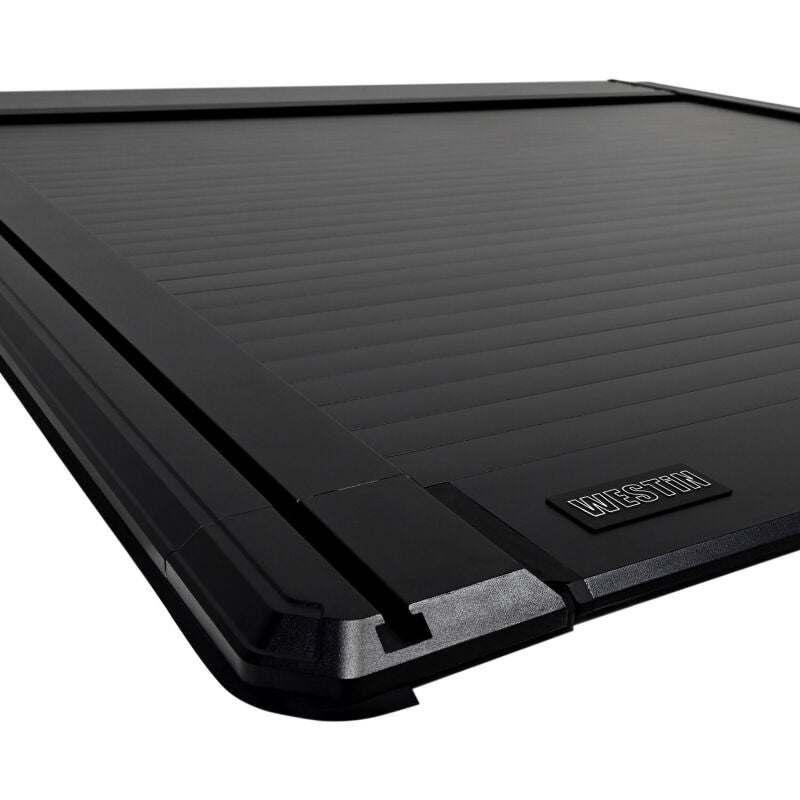 Westin 16-23 Toyota Tacoma 5ft 5in Bed Manual Retractable Tonneau Cover - Black